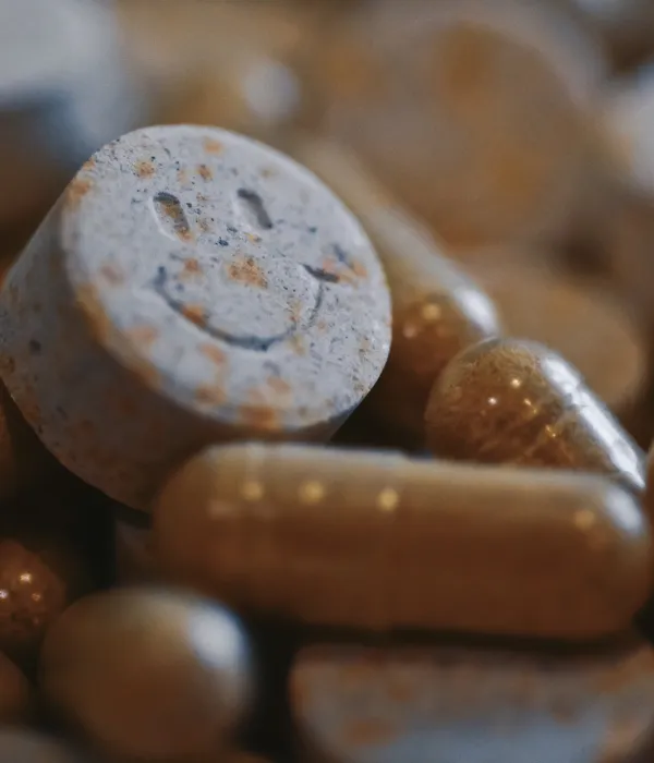 lost angels drug detox pills capsules scattered table