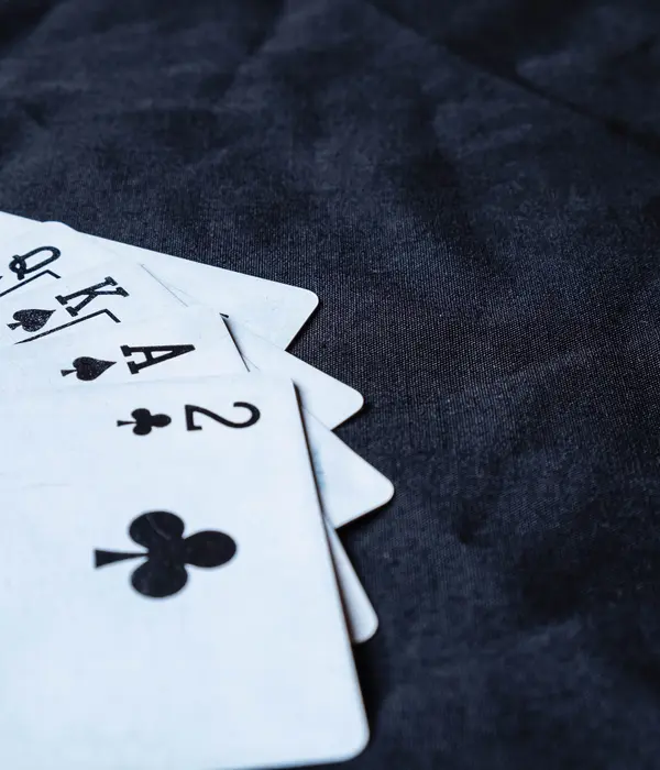 lost angels gambling addiction four aces playing cards black background