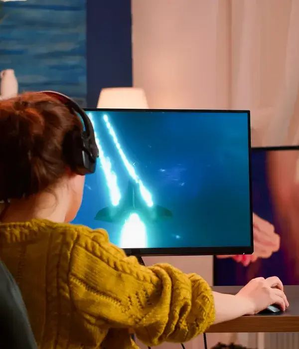 lost angels gaming addiction woman sitting desk computer