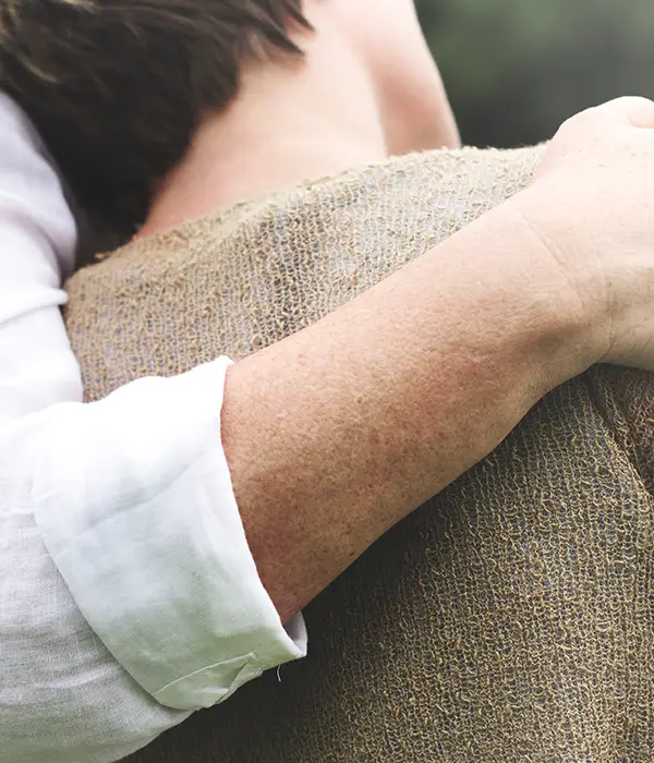 lost angels therapy man holding sack grain
