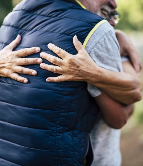 lost angels therapy man hugging wife woods