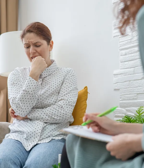lost angels therapy woman sitting couch hand chin man next