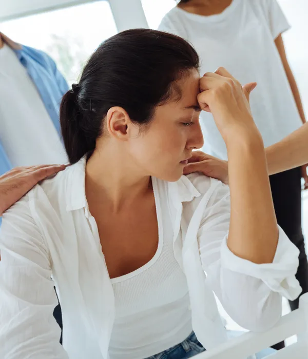 lost angels therapy woman sitting front mirror looking reflection