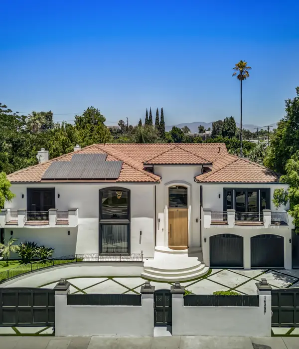 lost angels white house red roof large driveway